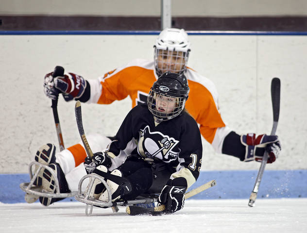Sledge Hockey - Children learning the game at practice
