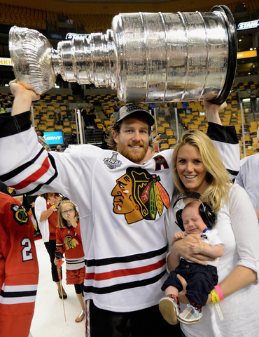Duncan Keith with wife Kelly-Rae & Stanley Cup Baby Duncan 2013