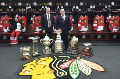 Stan & Scotty Bowman with the 6 NHL trophies the Blackhawks Won