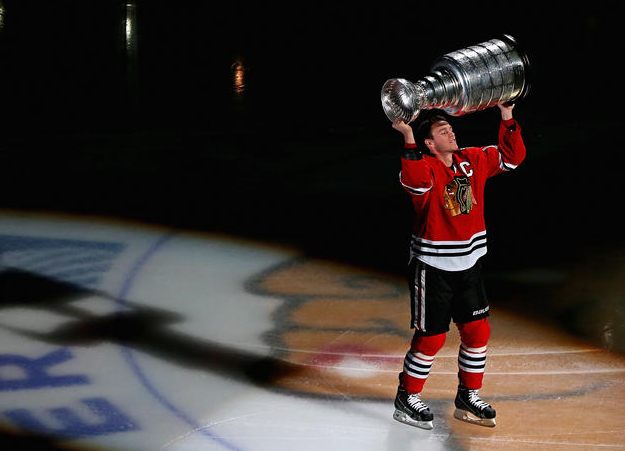 Jonathan Toews lifts Stanley Cup - Chicago Banner Raising - 2013