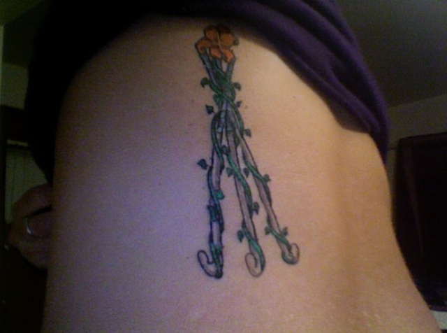 Field Hockey Tattoo - 3 Sticks wrapped in Ivy with a Rose on top