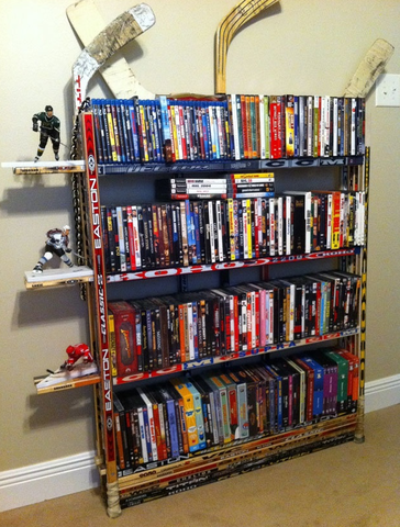 Hockey Stick Bookcase holding all your favourite Hockey Movies
