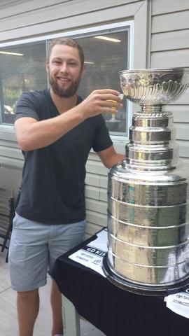 Jacob Muzzin gives a toast to the Stanley Cup in Woodstock 2014