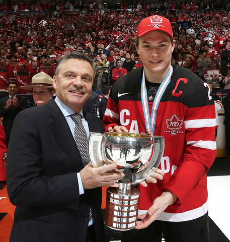 IIHF President Rene Fasel Presents Curtis Lazar Champions Trophy