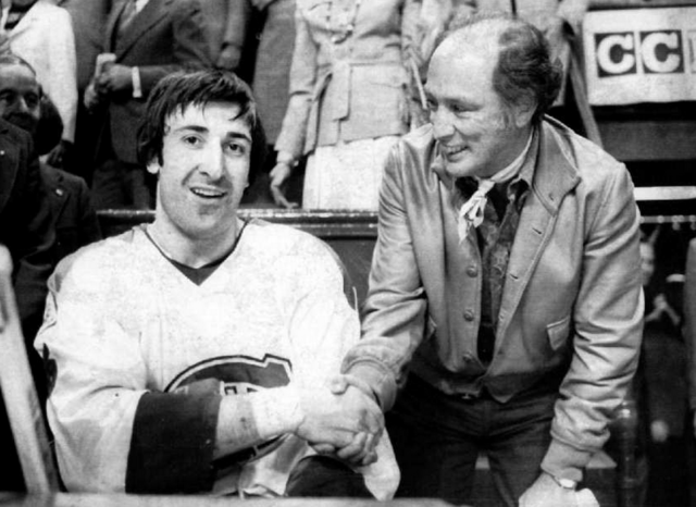 Guy Lapointe accepts Congrats Handshake from Pierre Trudeau 1976