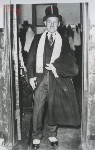 Conn Smythe at the Toronto Maple Leafs dressing room in a Tophat & Spats in 1937