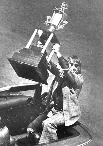 Galen Head, captain of the Johnstown Jets lifts the Lockhart Cup 1975