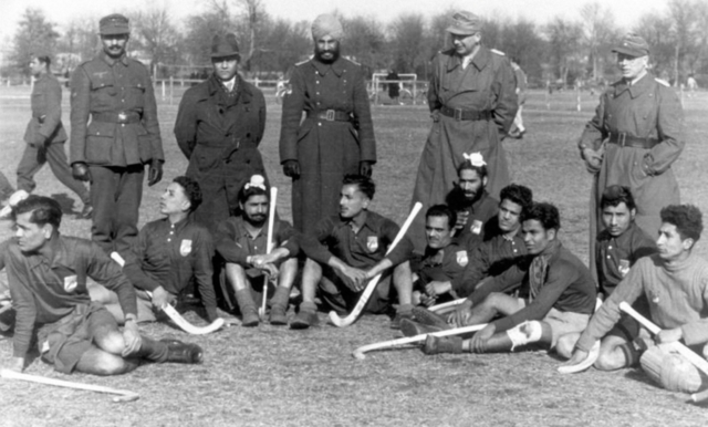 Sikh Soldiers playing Field Hockey in France 1944