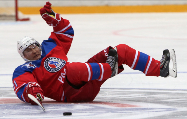 Vladimir Putin Falls to the Ice Playing Hockey 2017