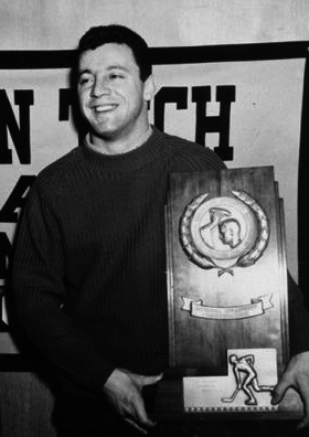 Tony Esposito with the 1965 NCAA Division 1 Championship Hockey Trophy