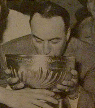Toe Blake drinks from The Stanley Cup 1960