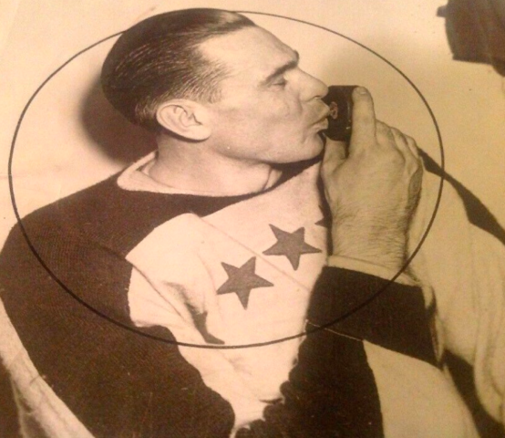 Lorne Carr Kisses the Puck after he scored winning goal in 4th overtime 1938