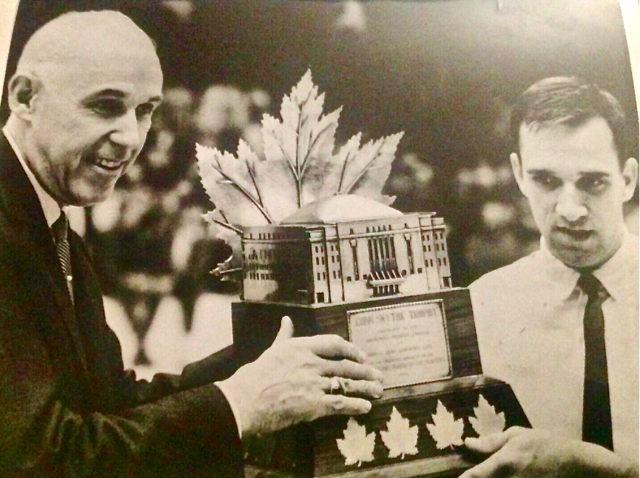 Clarence Campbell presents 1966 Conn Smythe Trophy Winner Roger Crozier