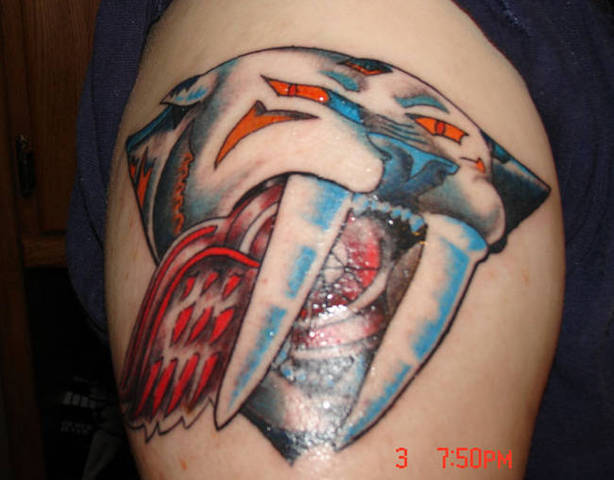Nashville Predators Tattoo eating a Red Wing