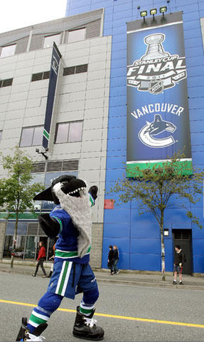 Fin outside Rogers Arena with Stanley Cup Playoff Banner 2011