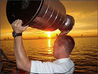 Kris Draper Hoists The Stanley Cup at Sunset