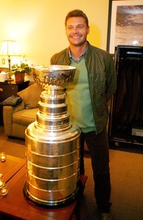 Ryan Seacrest with the Stanley Cup