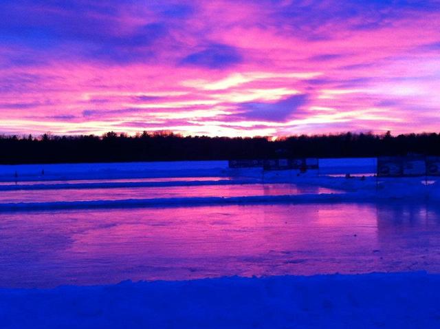 Sunset Over The Pond Hockey Rinks at Dollar Lake