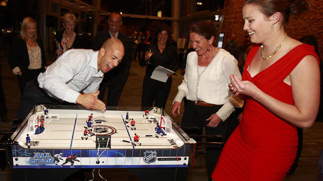 Manny Malhotra disputes the call on the Table Hockey Game - 2011