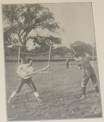 Hurling Players about to strike a Sliotar with a Hurley - 1898