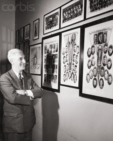 Lester Patrick Admiring Photos of Stanley Cup Champion Rangers