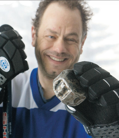 Blind Hockey player & comedian Mike Simmonds shows Metal Puck