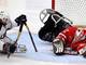 Sledge Hockey - USA Greg Shaw shoots @ Benoît St-Amand of Canada
