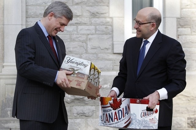 Gold Medal Beer - Prime Minister Harper presented with his Beer