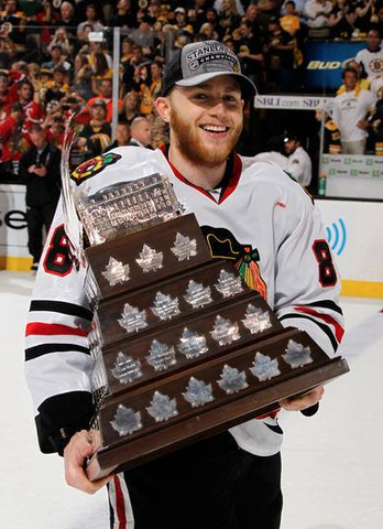 Patrick Kane Holds The Conn Smythe Trophy - 2013 Stanley Cup MVP