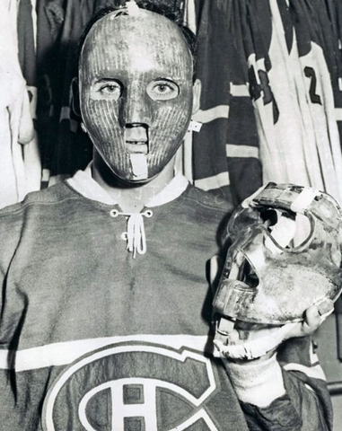 Jacques Plante Wearing  & Holding a Rare Goalie Mask
