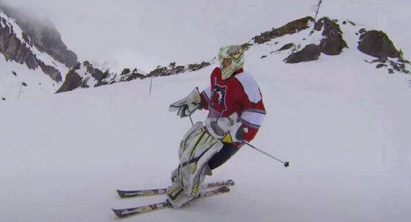 Ice Hockey Goaltender in Full Gear Skiing - Skiing Goalie