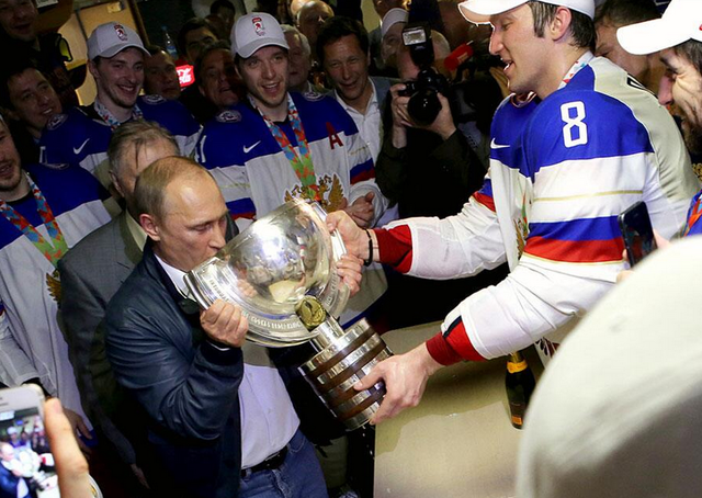Vladimir Putin drinks from IIHF World Championship Trophy 2014