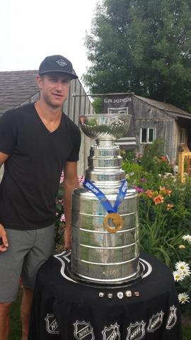 Jeff Carter poses with Stanley Cup, 2014 Olympic Gold Medal