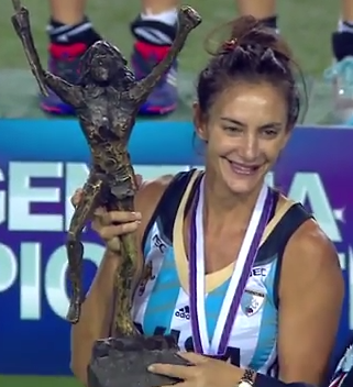 Luciana Aymar Holds the 2014 Hockey Champions Trophy