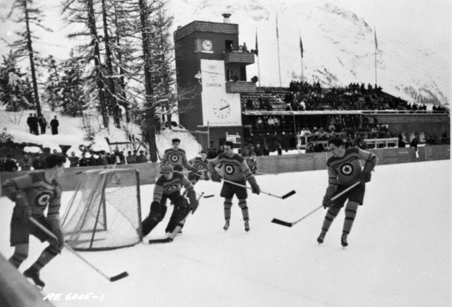 RCAF Flyers Game action vs Sweden at 1948 Winter Olympics