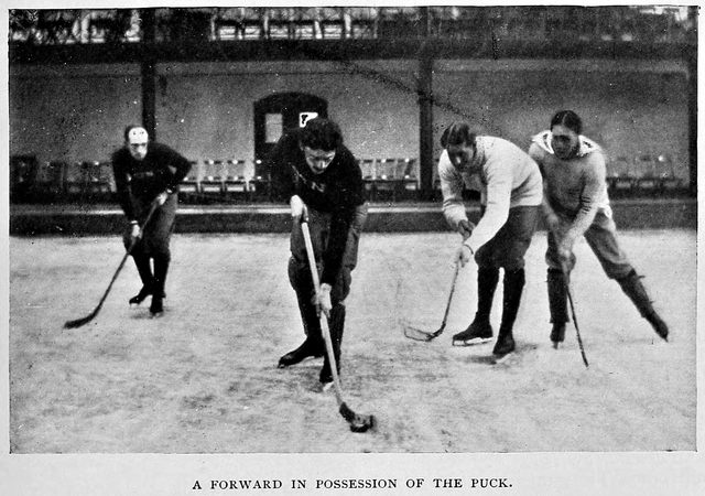 A forward in possession of the puck