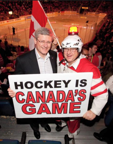 Dave Ash with Canadian Prime Minister Steven Harper at the 2010 Olympics Hockey