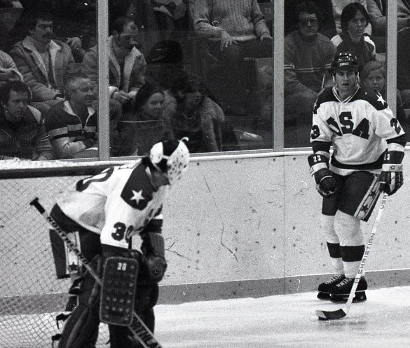 Jim Craig watches Dave Christian with puck during Miracle On Ice game ...