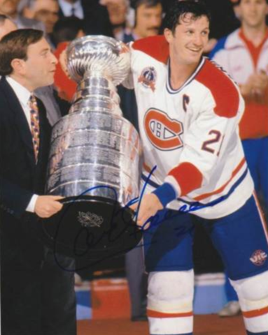 Montreal Canadiens Guy Carbonneau accepts The Stanley Cup from Gary Bettman 1993