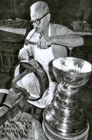 Carl Poul Petersen working on the Stanley Cup at C. P. Petersen & Sons studio