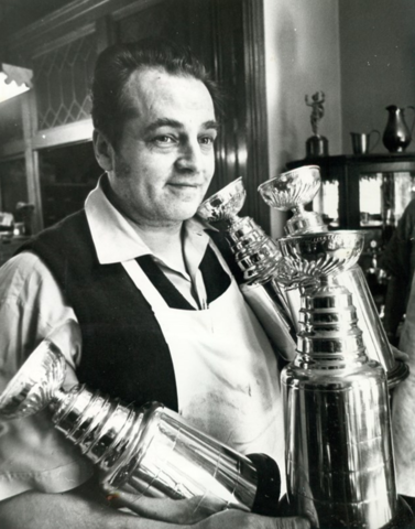 Arno Petersen with mini Stanley Cups made by C. P. Petersen & Sons