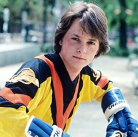 Michael J. Fox wearing a Vintage Vancouver Canucks Jersey 1983