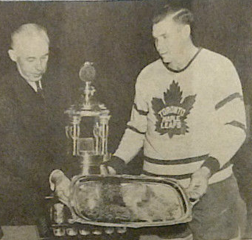 Harry Lumley accepting the Vezina Trophy & Plaque from Clarence Campbell 1954