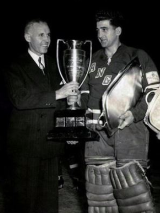 Clarence Campbell presents the 1950 Hart Memorial Trophy to Chuck Rayner