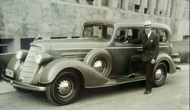 Newsy Lalonde Montreal Canadiens Coach with a 1934 Oldsmobile F34 Touring Sedan