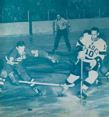 Vancouver Canucks Larry Popein checks Los Angeles Blades Willie O’Ree 1963