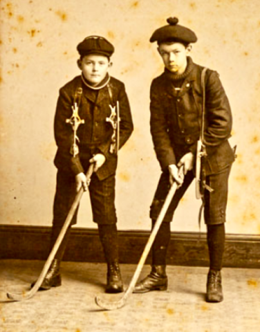 Antique Ice Polo - 2 young boys with Ice Polo Sticks & Skates - late 1890s