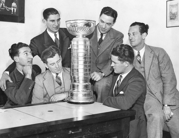 Chicago Black Hawks admiring the 1938 Stanley Cup