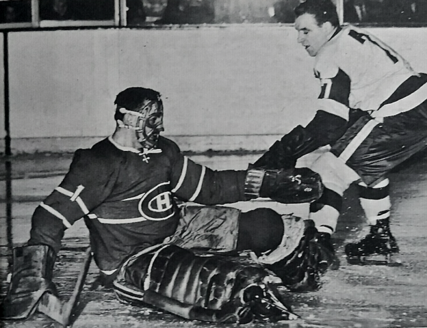 Montreal Canadiens Charlie Hodge makes save vs Red Wings Norm Ullman 1965