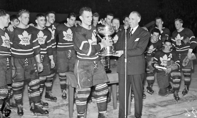Teeder Kennedy accepts 1949 Stanley Cup from NHL President Clarence Campbell